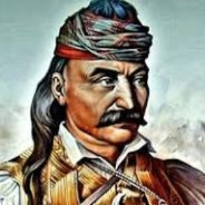 Θεόδωρος Κολοκοτρώνης. Λιθογραφία του Giovani Boggi από το λεύκωμα με 24 πορτραίτα Ελλήνων και Οθωμανών αξιωματούχων που έδρασαν κατά την Ελληνική Επανάσταση με τίτλο: "Collection de portraits des personnages Turcs and Grecs les plus recommes soit par leu